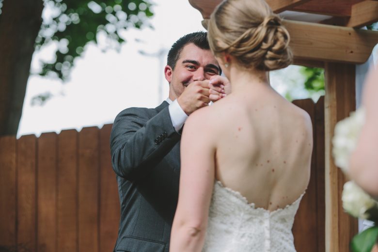 bride and groom fist bump during ceremony