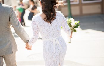 back of bride walking away