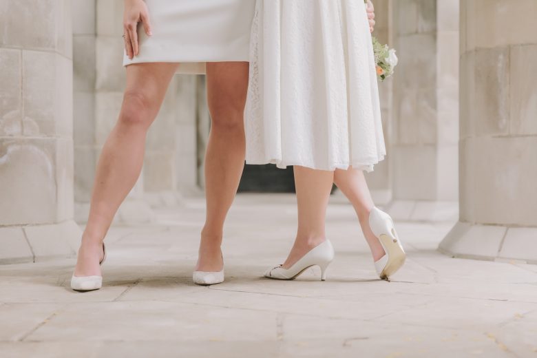 two brides standing together