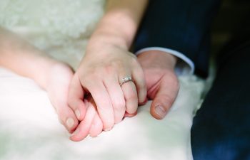man and woman holding hands