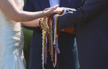 bride and groom during handfasting ceremony