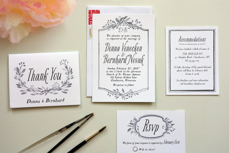 white wedding invitations with black type