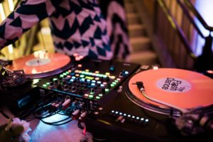 pink dj disc on a turn table at a reception
