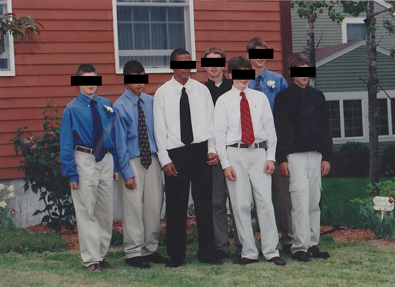 a group of teenage boys are dressed for a middle school dance, with their identities obscured