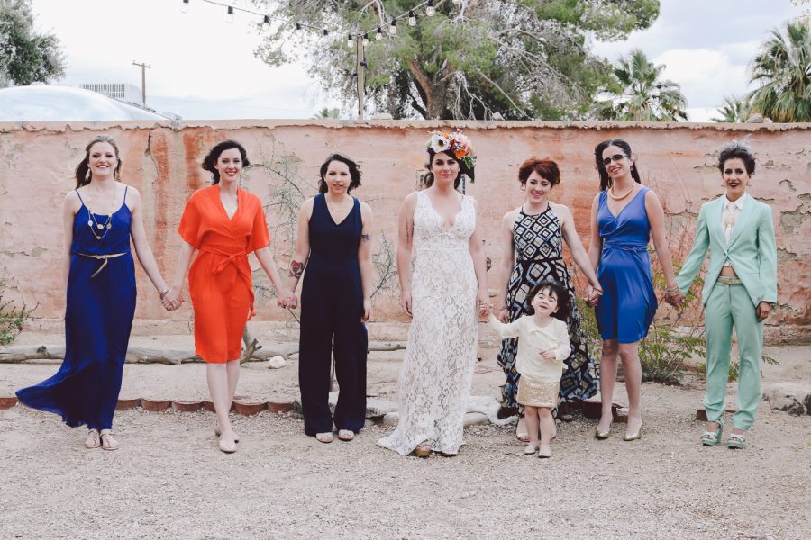 Bridal party in mismatched dresses and pants