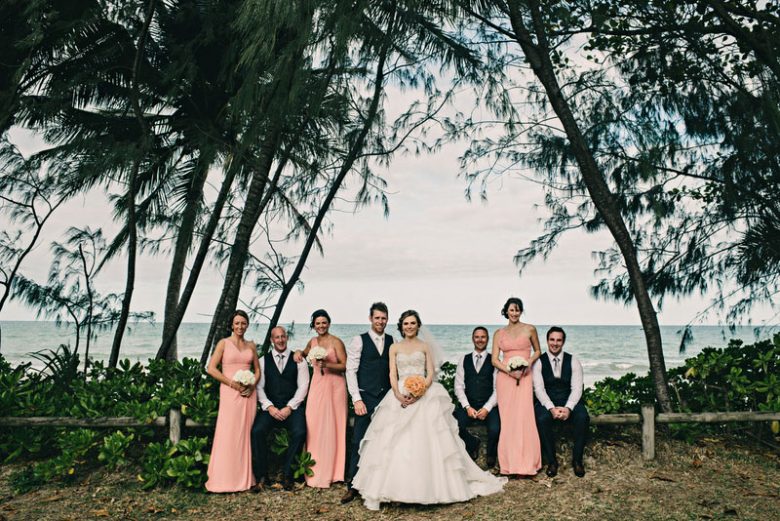 Bridal party group photo on beach