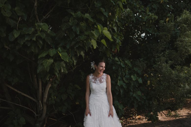 bride in front of trees