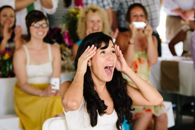 Bride laughing during wedding