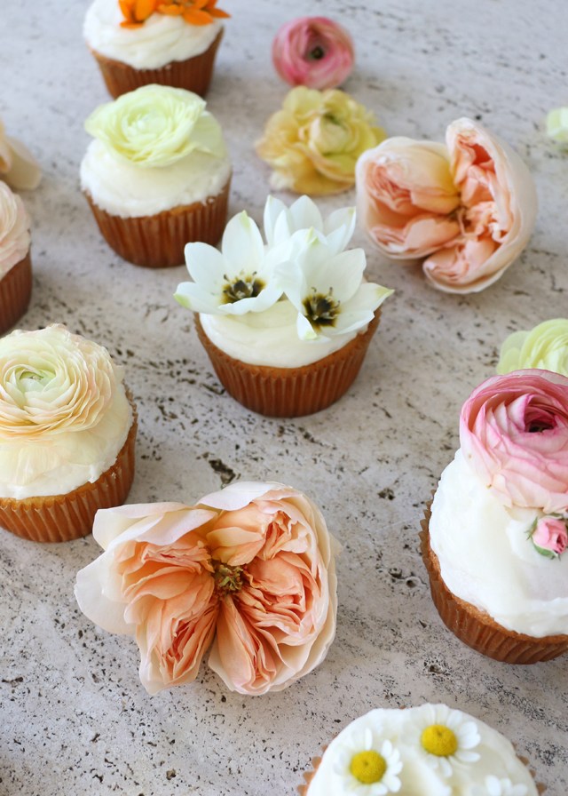 cupcakes covered in flowers