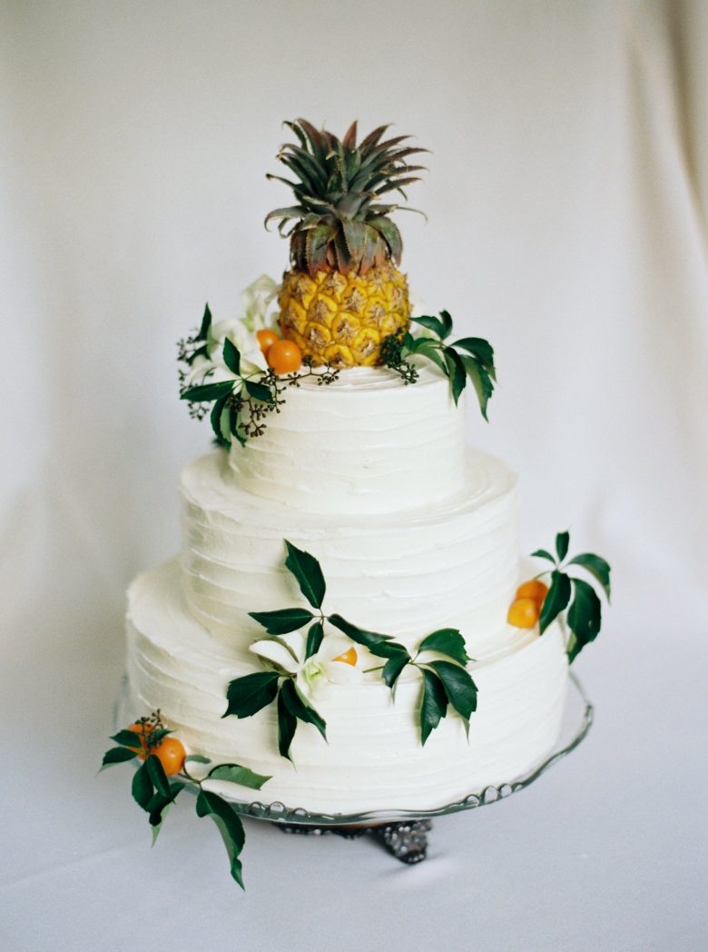 wedding cake with pineapple cake topper