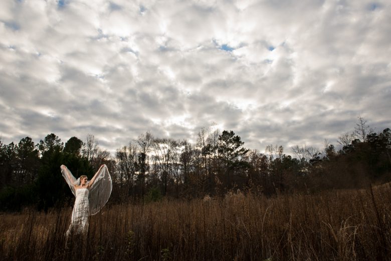epic photo of bride in field