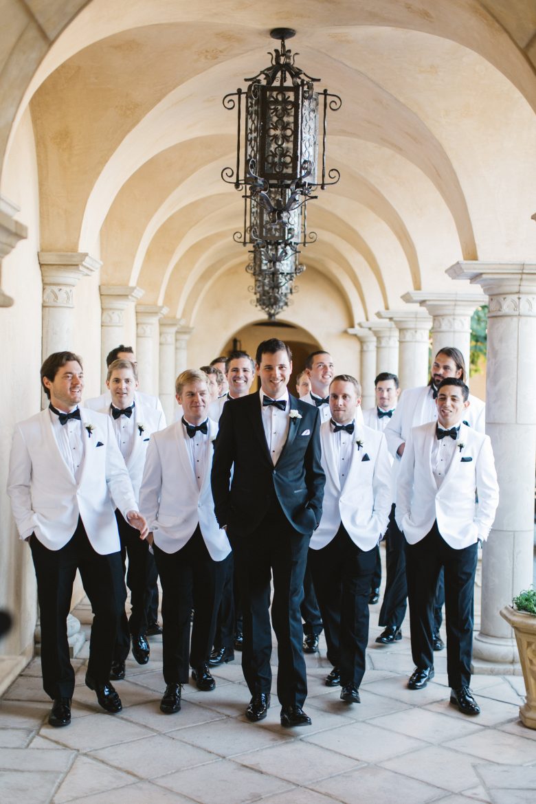wedding party in white tuxedos