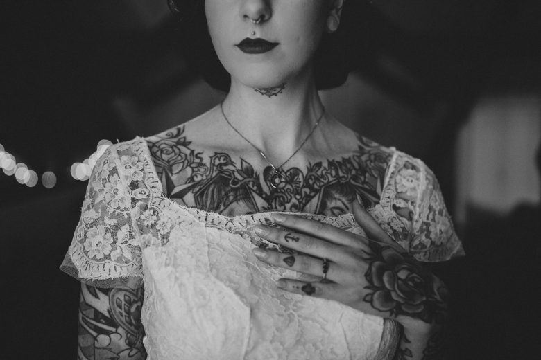 black and white photo of tattooed bride