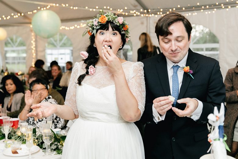 bride eating wedding cake