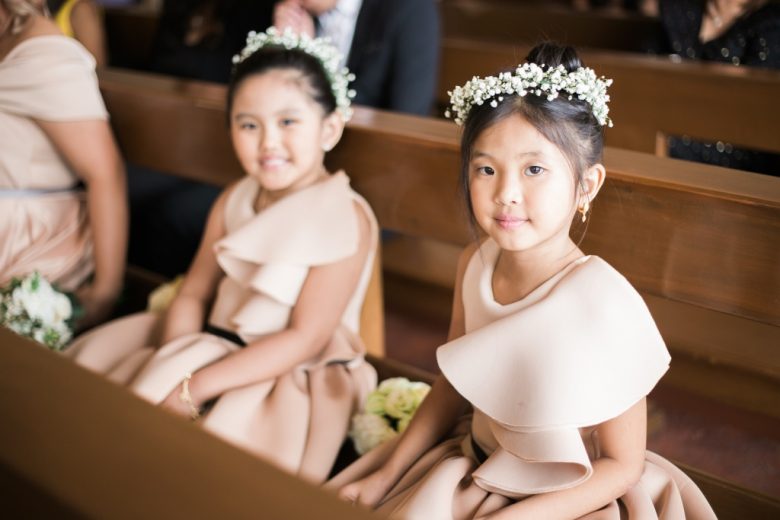 two girls in audience for wedding
