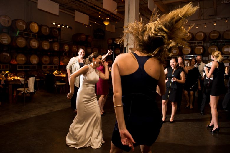 bride dancing at winery