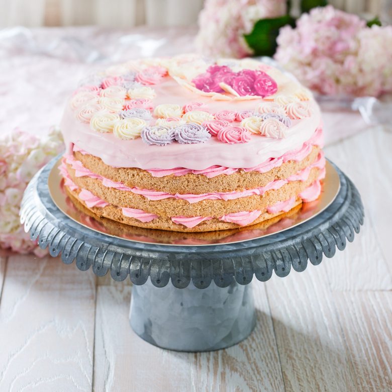 wedding cake with pink frosting