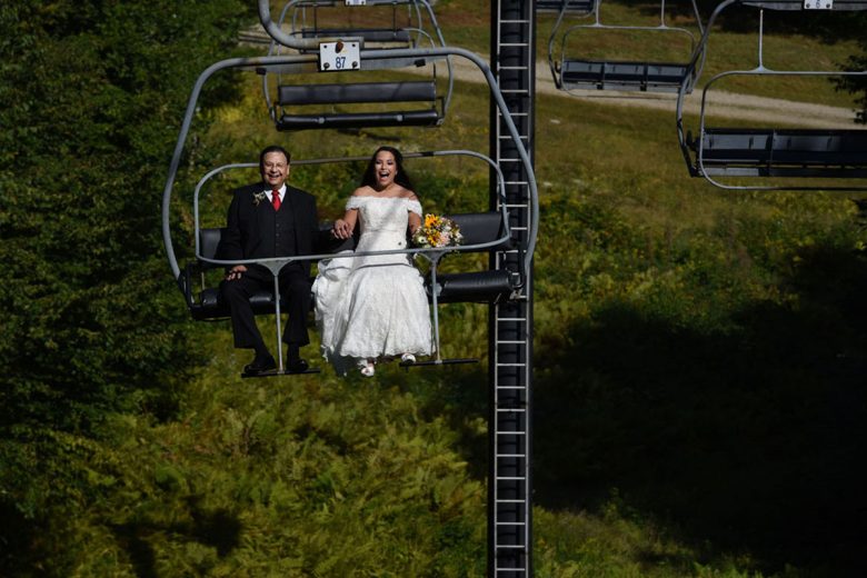 bride and father on a sky lift