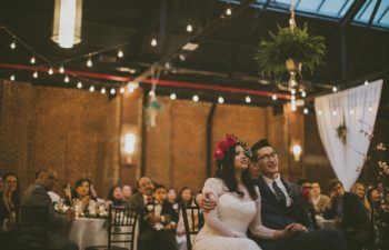 couple listening to a best man toast