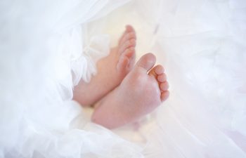 baby feet in white