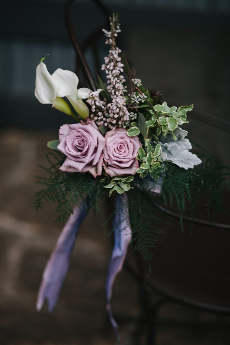 bouquet with calla lilies and purple roses
