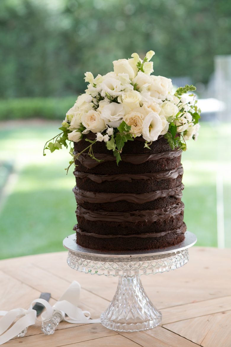 chocolate cake with white flowers