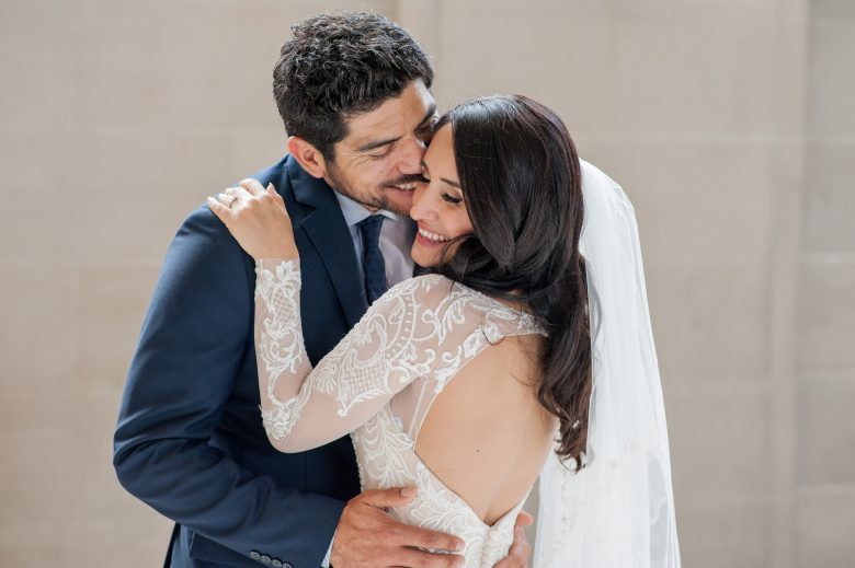 man and woman eloping at san francisco city hall