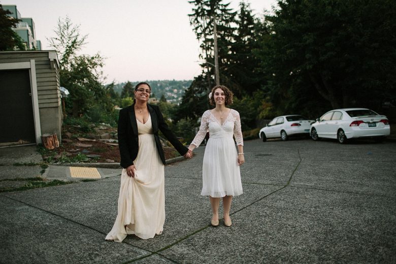 two women in white wedding dreses eloping in seattle