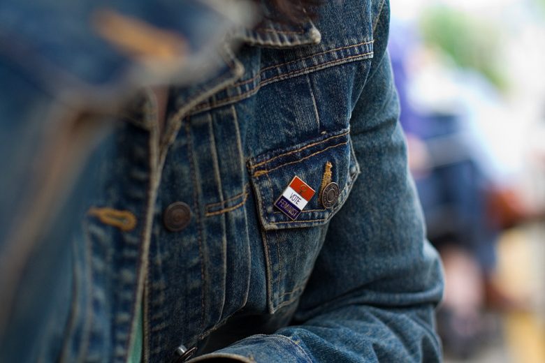 i vote feminist pin on jacket