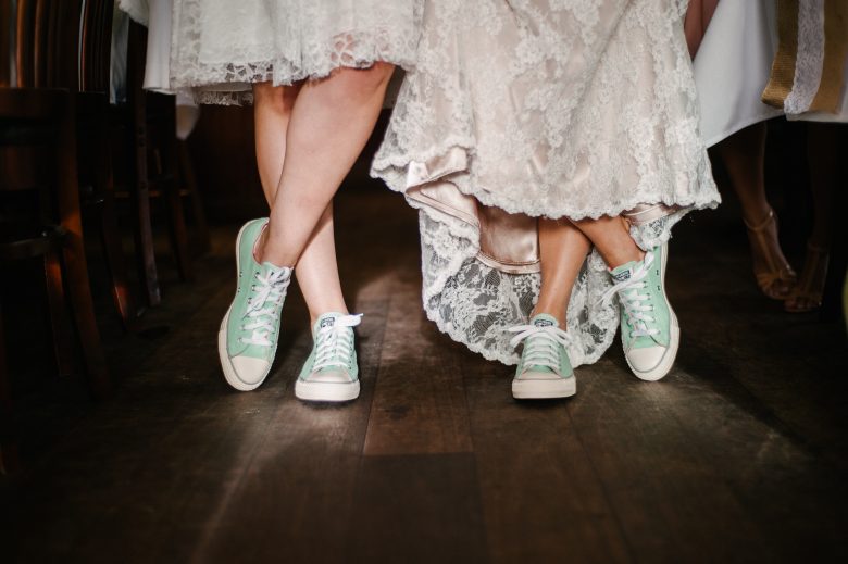 tennis shoes and wedding gowns