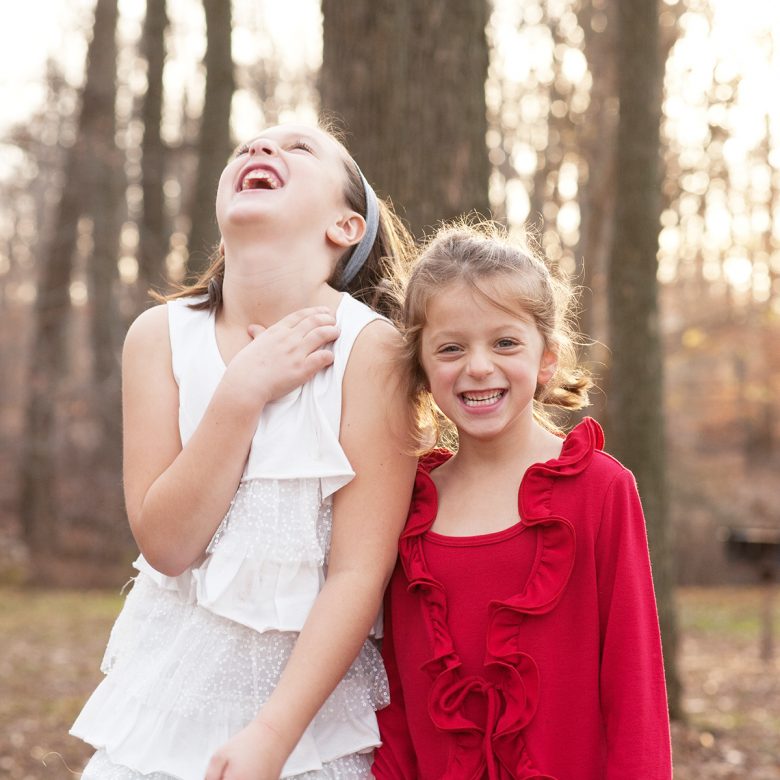 two little girls laughing