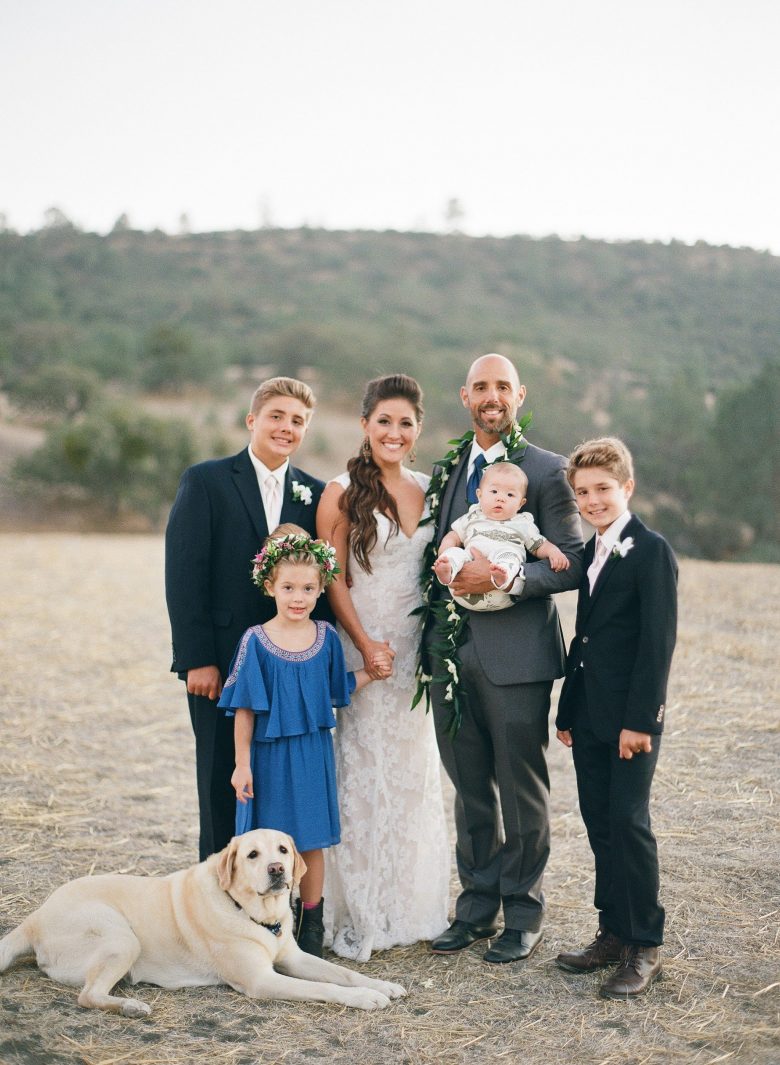 portrait of blended family after wedding ceremony
