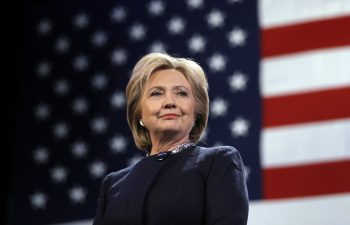 hillary clinton in front of american flag