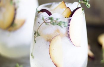 plum and thyme prosecco smash winter cocktail