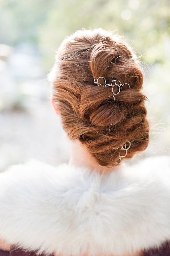 twisted updo hairstyle with hair jewlery