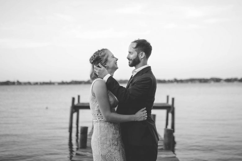black and white photo of a couple by a lovely photo