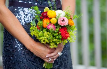 maid of honor holding a wedding bouquet