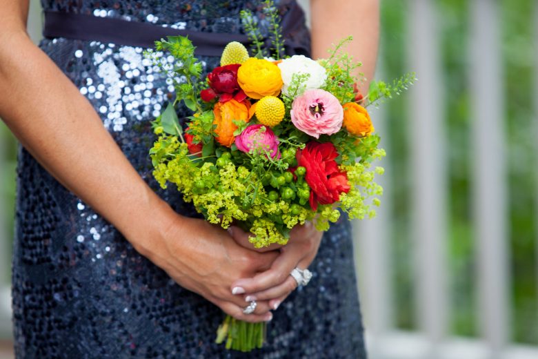 maid of honor holding a wedding bouquet