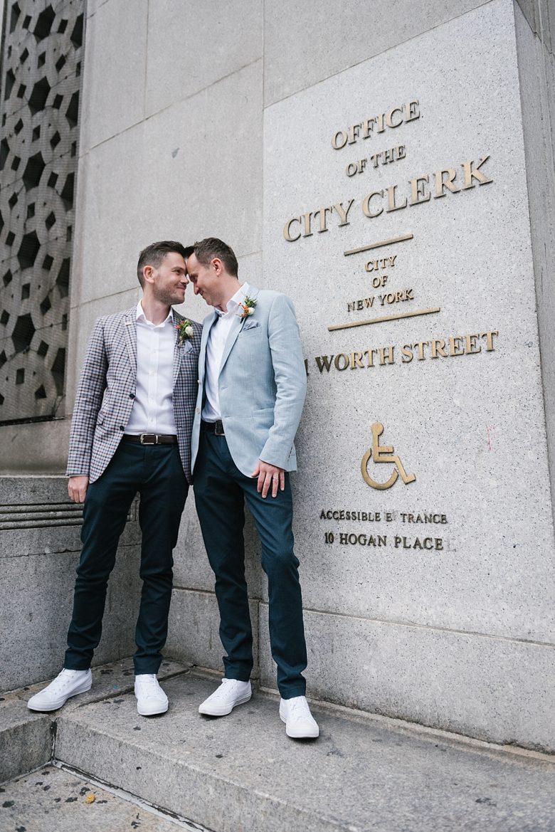 Two grooms outside of office of the city clerk, new york city hall
