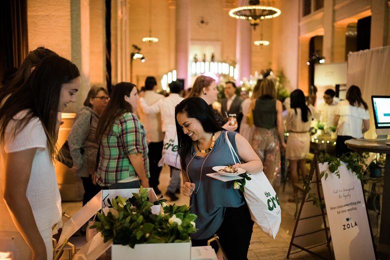 a woman visiting booths at the cream event in san francisco