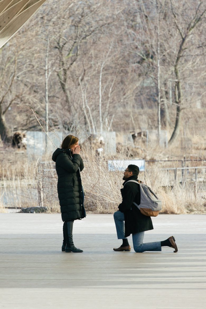 a man proposing during a surprise proposal