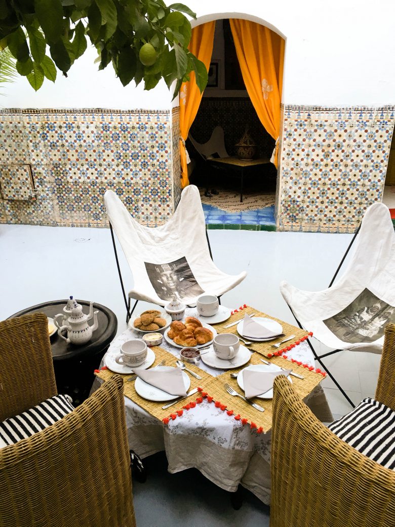 courtyard breakfast table with tile detail and lime tree