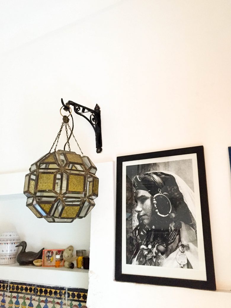 ornate lamp and image of a moroccan girl 
