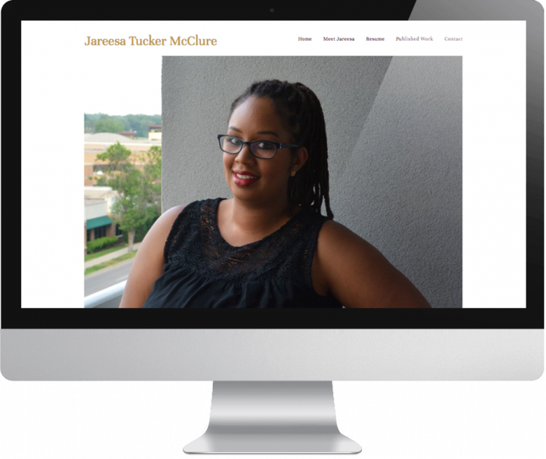Jareesa Tucker McClure website on monitor