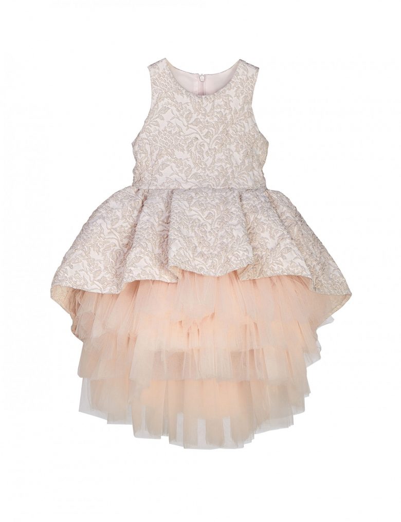 Peach dress with a high low tulle skirt with a peplum