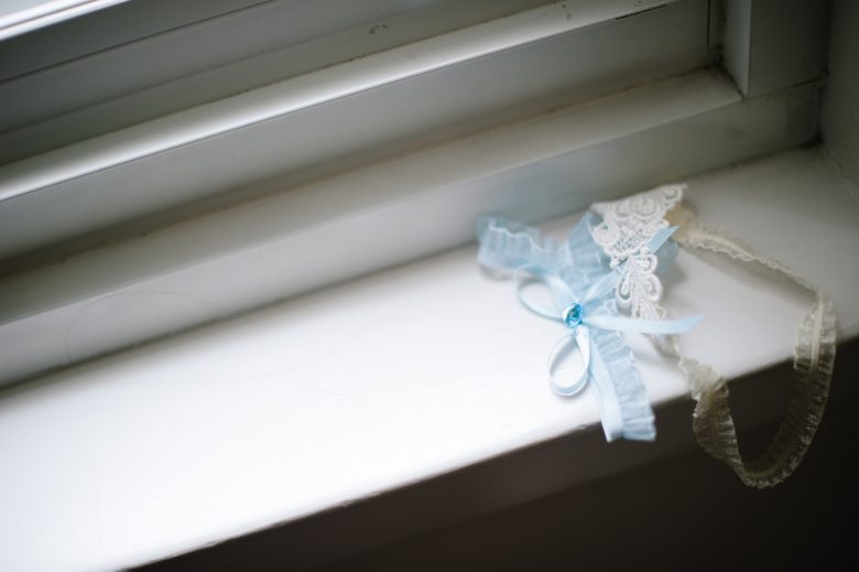Blue and white garter on windowsill