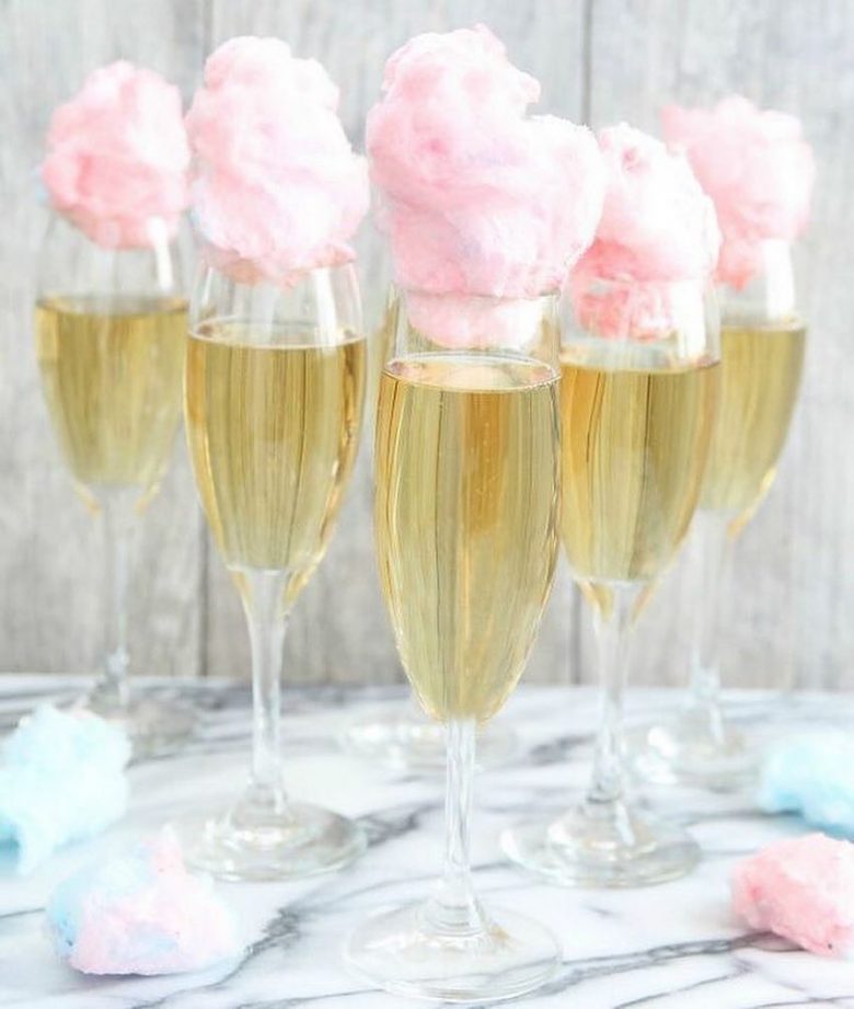 champagne flutes topped with pink cotton candy