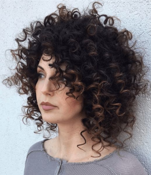 woman with loose messy curls