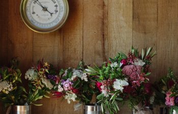 Bridal bouquets in tin cans