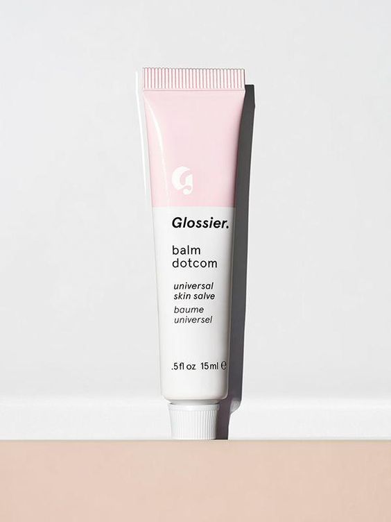 pink and white tube of glossier skincare balm dotcom universal skincare salve